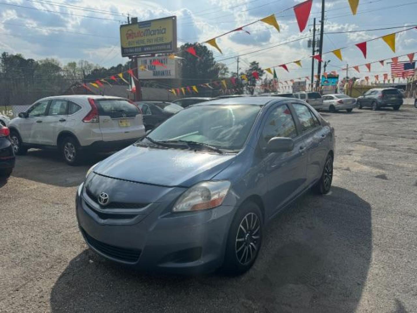 2008 Blue Toyota Yaris Sedan S (JTDBT923X84) with an 1.5L L4 DOHC 16V engine, 4-Speed Automatic transmission, located at 1806 Veterans Memorial Hwy SW, Austell, GA, 30168, (770) 944-9558, 33.817959, -84.606987 - Photo#0