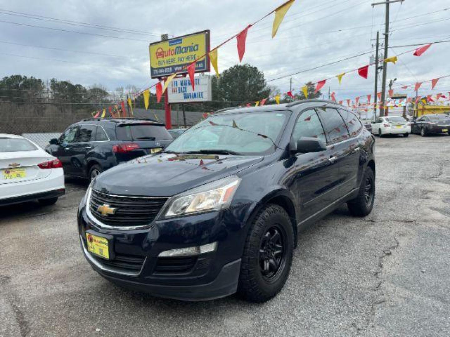 2015 Blue Chevrolet Traverse LS FWD w/PDC (1GNKRFEDXFJ) with an 3.6L V6 DOHC 24V engine, 6-Speed Automatic transmission, located at 1806 Veterans Memorial Hwy SW, Austell, GA, 30168, (770) 944-9558, 33.817959, -84.606987 - Photo#0