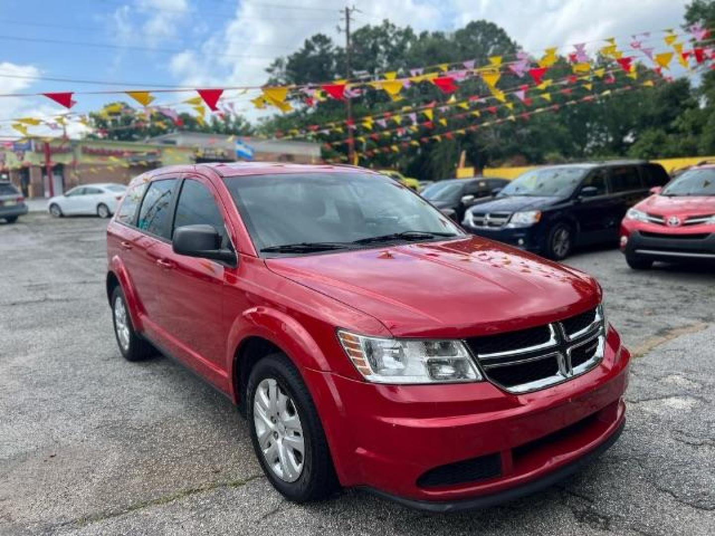 2015 Red Dodge Journey SE (3C4PDCAB5FT) with an 2.4L L4 DOHC 16V engine, 4-Speed Automatic transmission, located at 1806 Veterans Memorial Hwy SW, Austell, GA, 30168, (770) 944-9558, 33.817959, -84.606987 - Photo#0