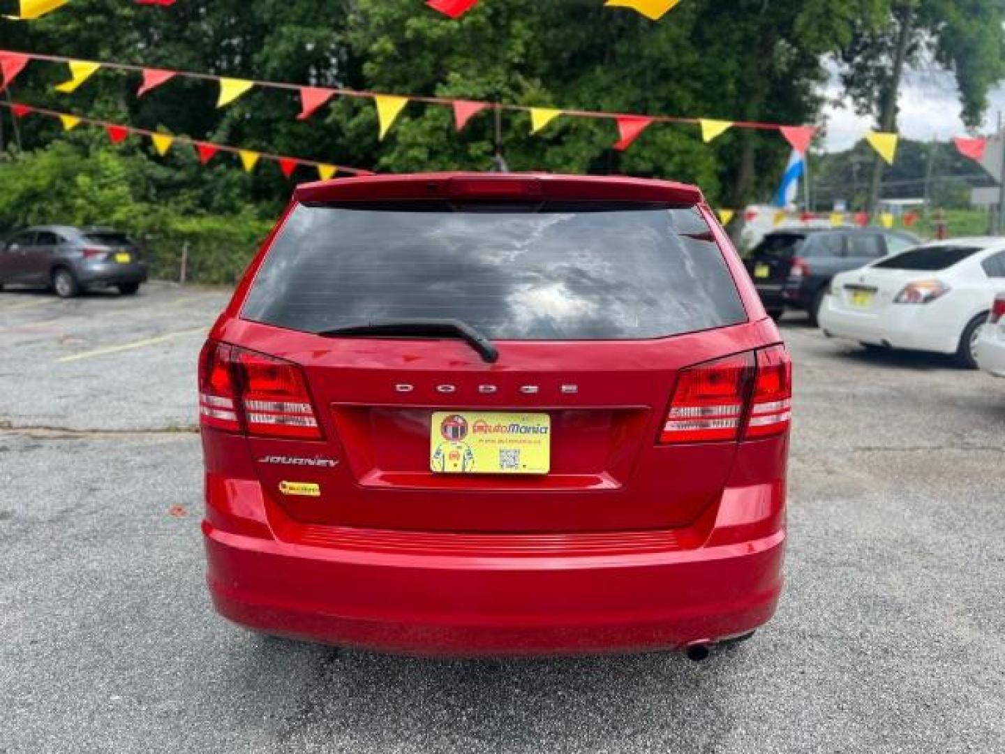 2015 Red Dodge Journey SE (3C4PDCAB5FT) with an 2.4L L4 DOHC 16V engine, 4-Speed Automatic transmission, located at 1806 Veterans Memorial Hwy SW, Austell, GA, 30168, (770) 944-9558, 33.817959, -84.606987 - Photo#1