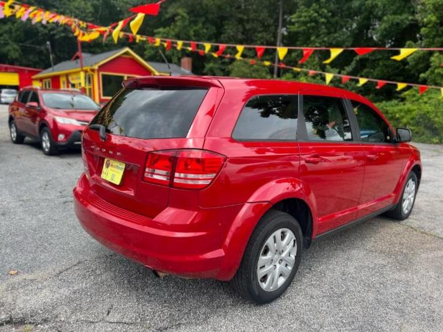 2015 Red Dodge Journey SE (3C4PDCAB5FT) with an 2.4L L4 DOHC 16V engine, 4-Speed Automatic transmission, located at 1806 Veterans Memorial Hwy SW, Austell, GA, 30168, (770) 944-9558, 33.817959, -84.606987 - Photo#4