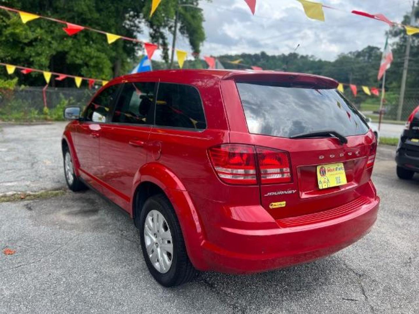 2015 Red Dodge Journey SE (3C4PDCAB5FT) with an 2.4L L4 DOHC 16V engine, 4-Speed Automatic transmission, located at 1806 Veterans Memorial Hwy SW, Austell, GA, 30168, (770) 944-9558, 33.817959, -84.606987 - Photo#5