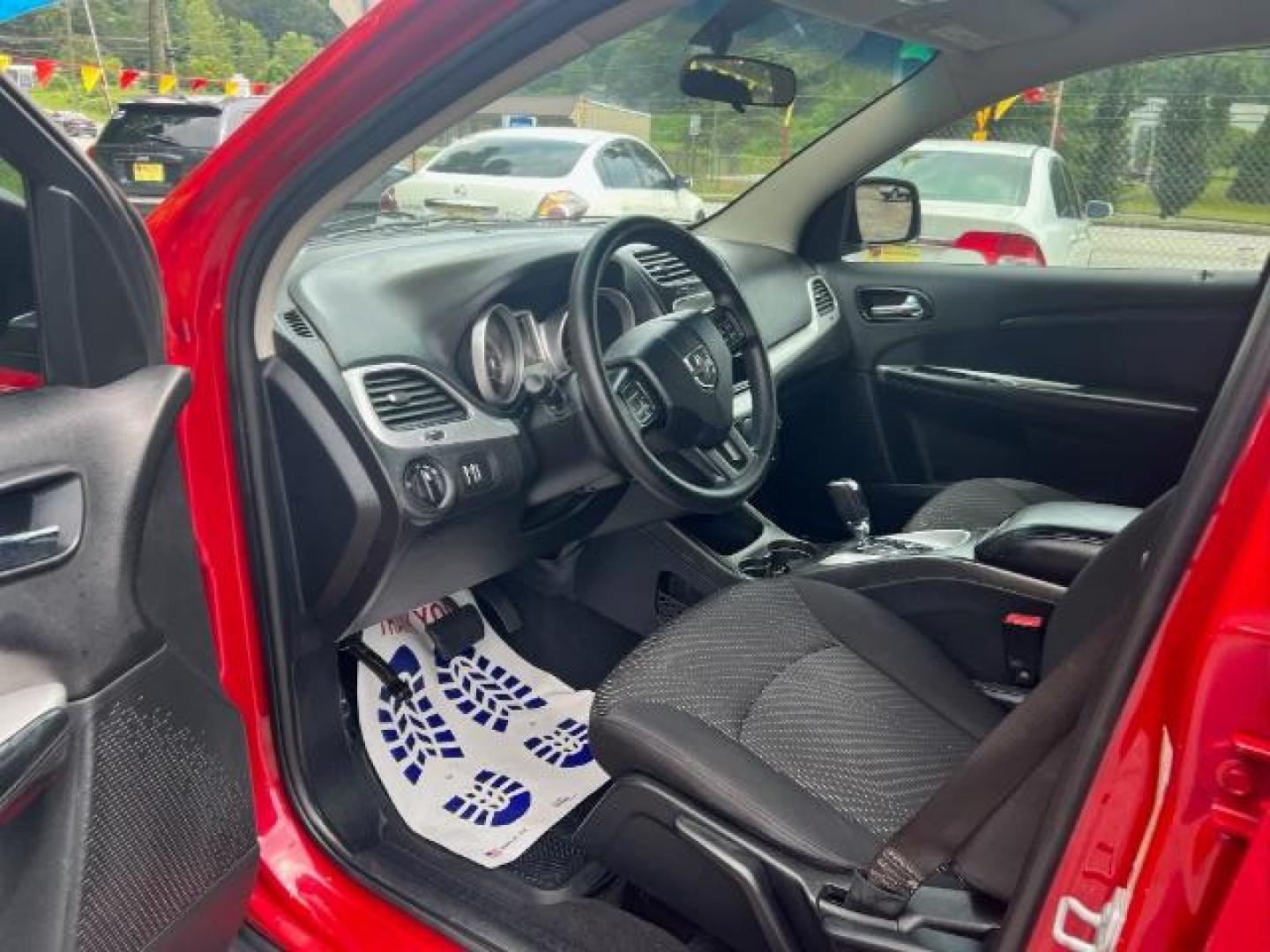 2015 Red Dodge Journey SE (3C4PDCAB5FT) with an 2.4L L4 DOHC 16V engine, 4-Speed Automatic transmission, located at 1806 Veterans Memorial Hwy SW, Austell, GA, 30168, (770) 944-9558, 33.817959, -84.606987 - Photo#6