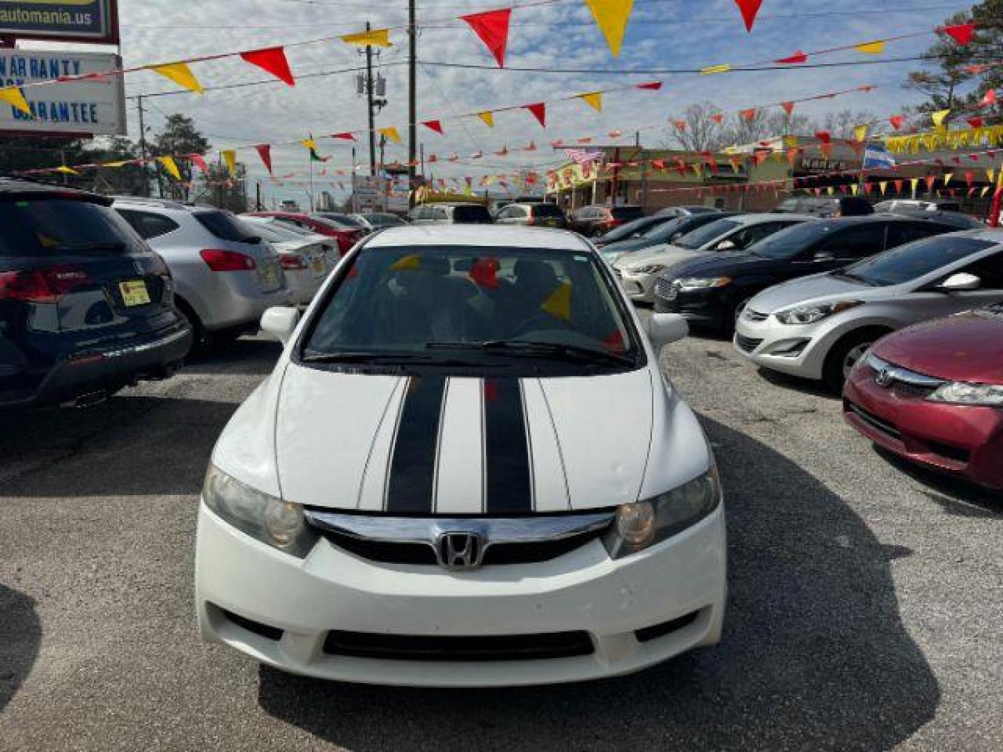 2011 White Honda Civic LX Sedan 5-Speed AT (19XFA1F55BE) with an 1.8L L4 SOHC 16V engine, 5-Speed Automatic transmission, located at 1806 Veterans Memorial Hwy SW, Austell, GA, 30168, (770) 944-9558, 33.817959, -84.606987 - Photo#1