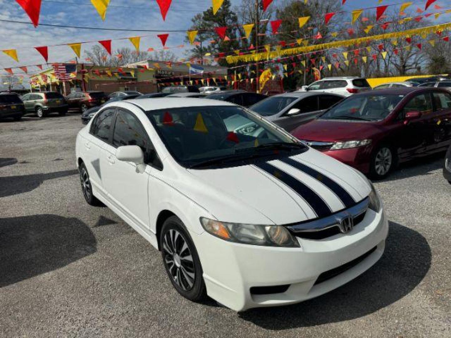 2011 White Honda Civic LX Sedan 5-Speed AT (19XFA1F55BE) with an 1.8L L4 SOHC 16V engine, 5-Speed Automatic transmission, located at 1806 Veterans Memorial Hwy SW, Austell, GA, 30168, (770) 944-9558, 33.817959, -84.606987 - Photo#2