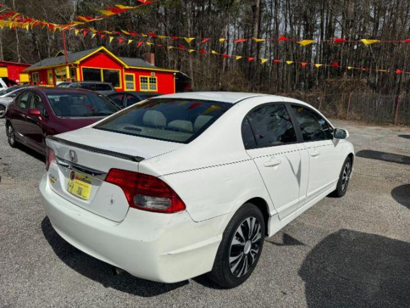 2011 White Honda Civic LX Sedan 5-Speed AT (19XFA1F55BE) with an 1.8L L4 SOHC 16V engine, 5-Speed Automatic transmission, located at 1806 Veterans Memorial Hwy SW, Austell, GA, 30168, (770) 944-9558, 33.817959, -84.606987 - Photo#2