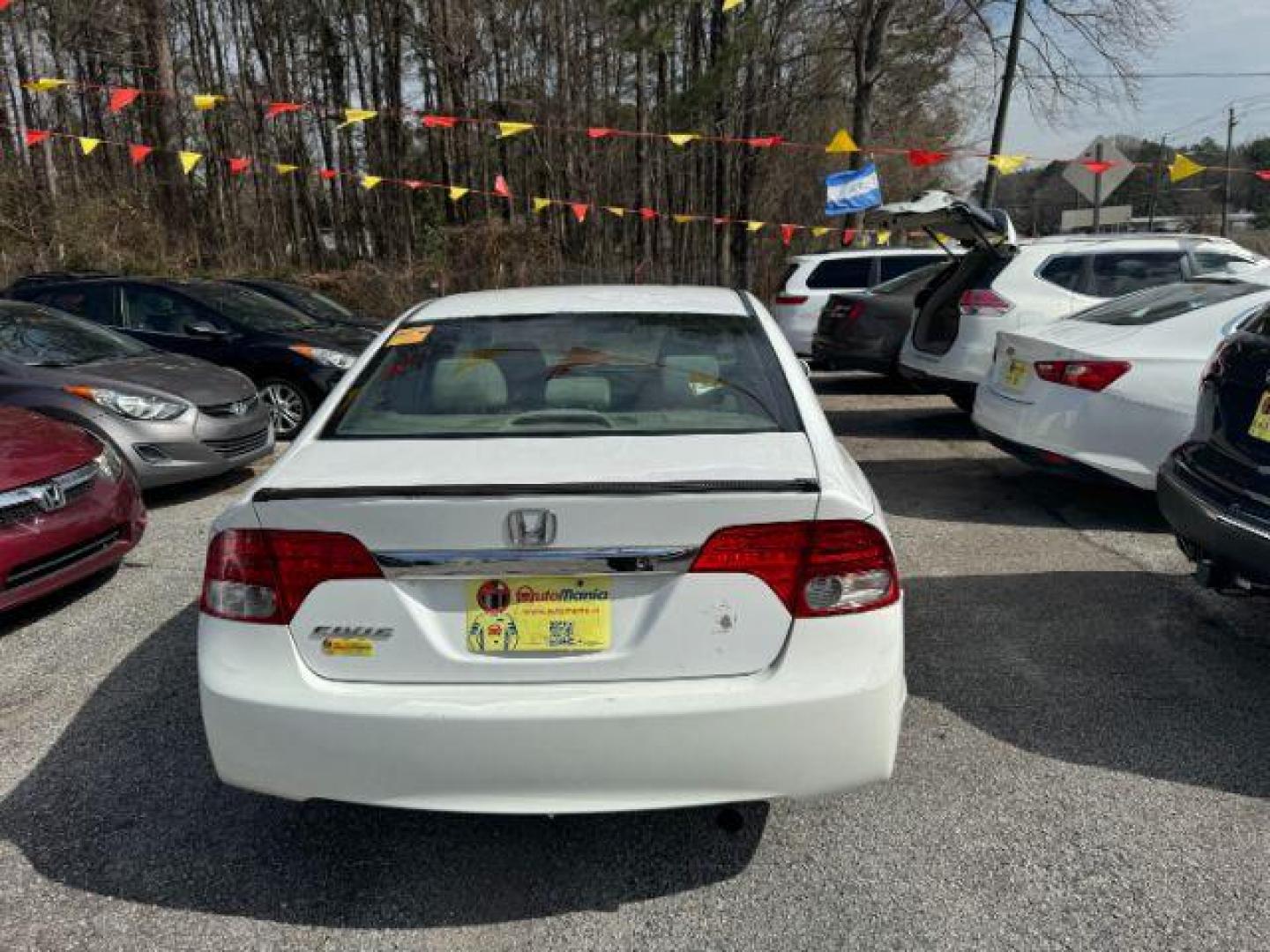 2011 White Honda Civic LX Sedan 5-Speed AT (19XFA1F55BE) with an 1.8L L4 SOHC 16V engine, 5-Speed Automatic transmission, located at 1806 Veterans Memorial Hwy SW, Austell, GA, 30168, (770) 944-9558, 33.817959, -84.606987 - Photo#4