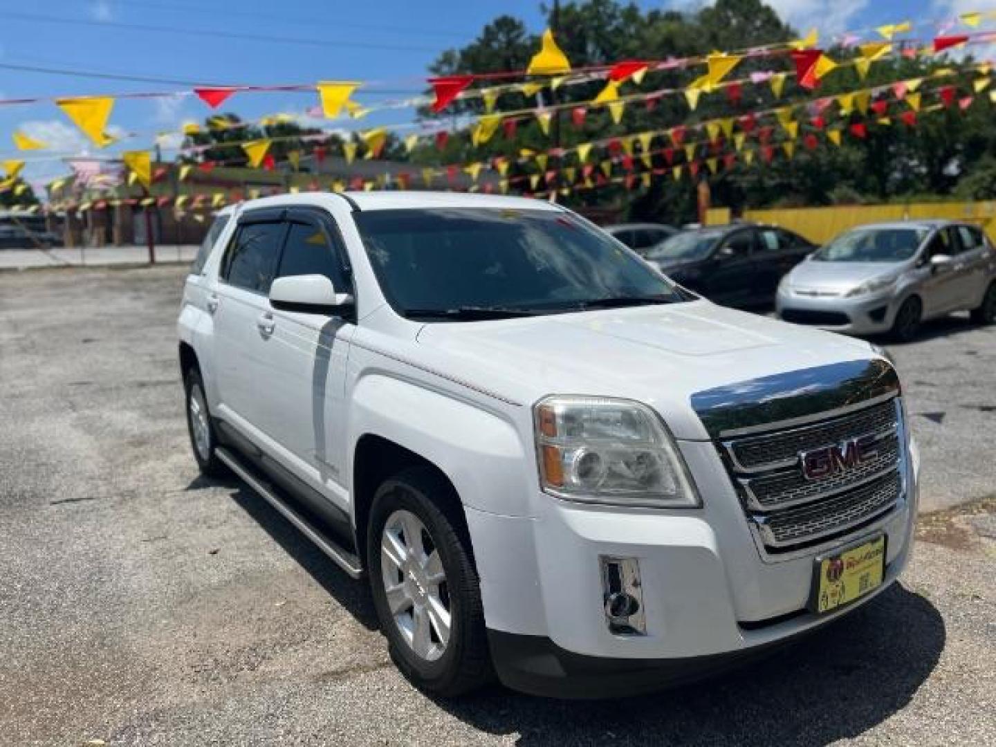 2013 White GMC Terrain SLE1 AWD (2GKFLREKXD6) with an 2.4L L4 DOHC 16V FFV engine, 6-Speed Automatic transmission, located at 1806 Veterans Memorial Hwy SW, Austell, GA, 30168, (770) 944-9558, 33.817959, -84.606987 - Photo#0