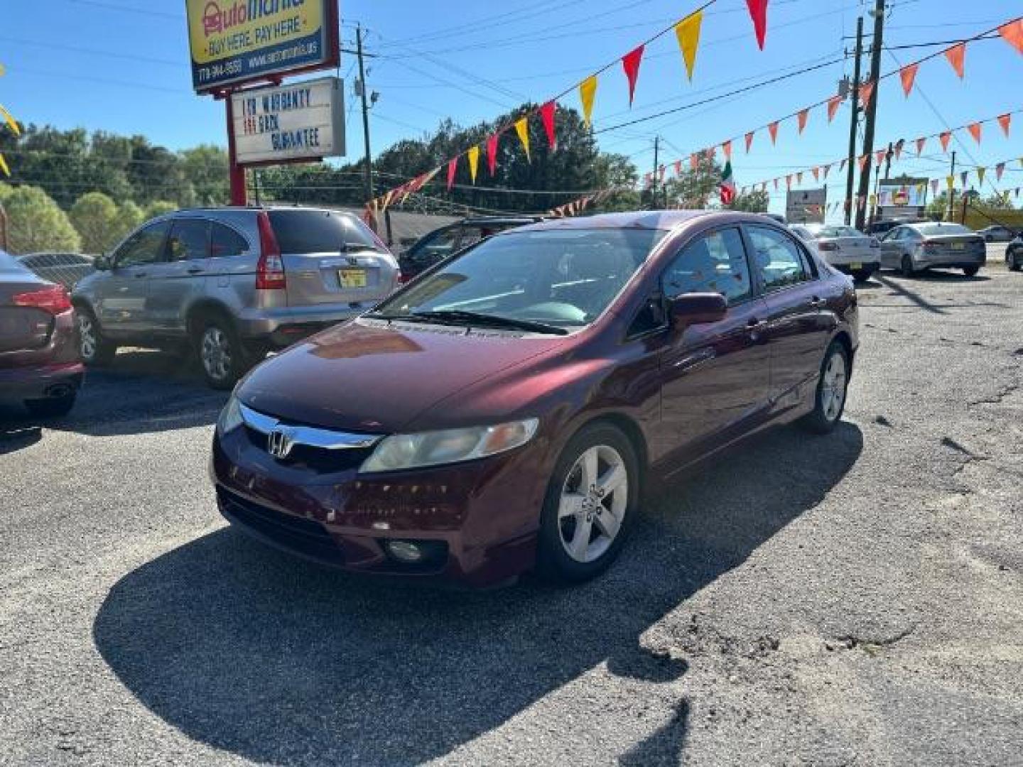 2010 MAROON Honda Civic LX-S Sedan 5-Speed AT (2HGFA1F68AH) with an 1.8L L4 SOHC 16V engine, 5-Speed Automatic transmission, located at 1806 Veterans Memorial Hwy SW, Austell, GA, 30168, (770) 944-9558, 33.817959, -84.606987 - Photo#0