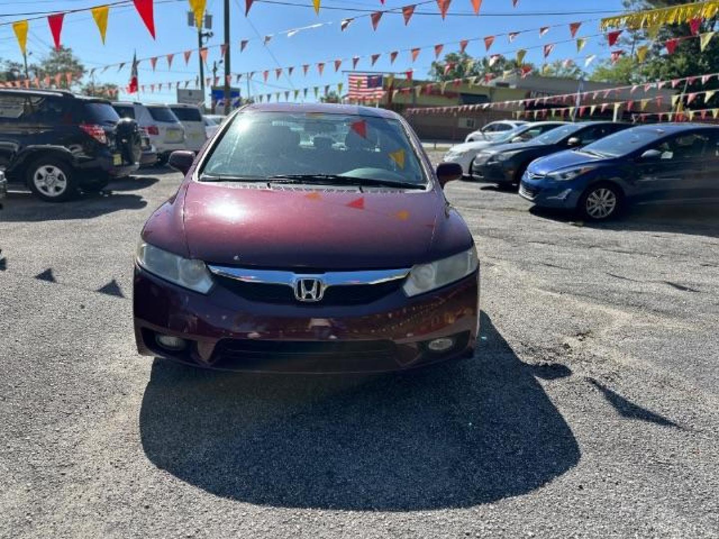 2010 MAROON Honda Civic LX-S Sedan 5-Speed AT (2HGFA1F68AH) with an 1.8L L4 SOHC 16V engine, 5-Speed Automatic transmission, located at 1806 Veterans Memorial Hwy SW, Austell, GA, 30168, (770) 944-9558, 33.817959, -84.606987 - Photo#1