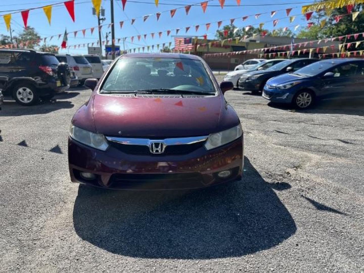 2010 MAROON Honda Civic LX-S Sedan 5-Speed AT (2HGFA1F68AH) with an 1.8L L4 SOHC 16V engine, 5-Speed Automatic transmission, located at 1806 Veterans Memorial Hwy SW, Austell, GA, 30168, (770) 944-9558, 33.817959, -84.606987 - Photo#2