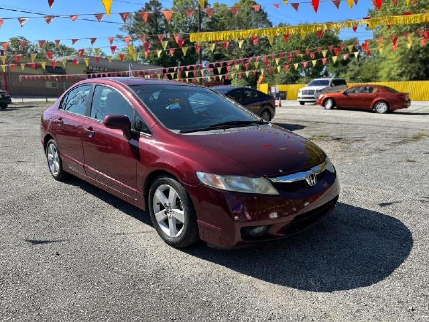 2010 MAROON Honda Civic LX-S Sedan 5-Speed AT (2HGFA1F68AH) with an 1.8L L4 SOHC 16V engine, 5-Speed Automatic transmission, located at 1806 Veterans Memorial Hwy SW, Austell, GA, 30168, (770) 944-9558, 33.817959, -84.606987 - Photo#3