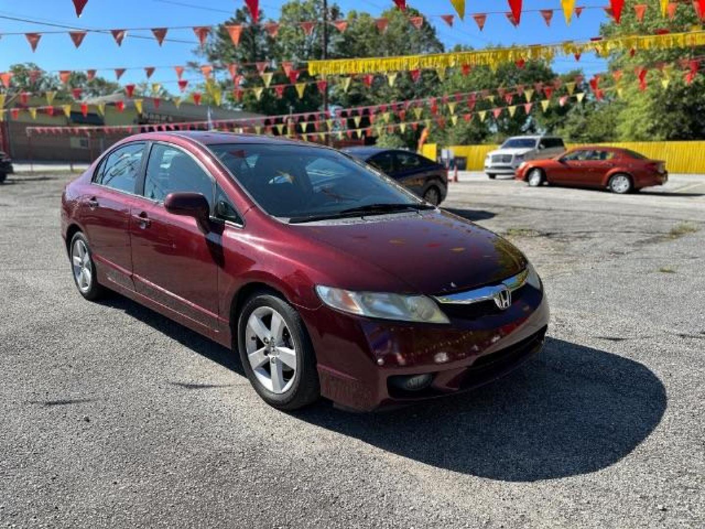 2010 MAROON Honda Civic LX-S Sedan 5-Speed AT (2HGFA1F68AH) with an 1.8L L4 SOHC 16V engine, 5-Speed Automatic transmission, located at 1806 Veterans Memorial Hwy SW, Austell, GA, 30168, (770) 944-9558, 33.817959, -84.606987 - Photo#4