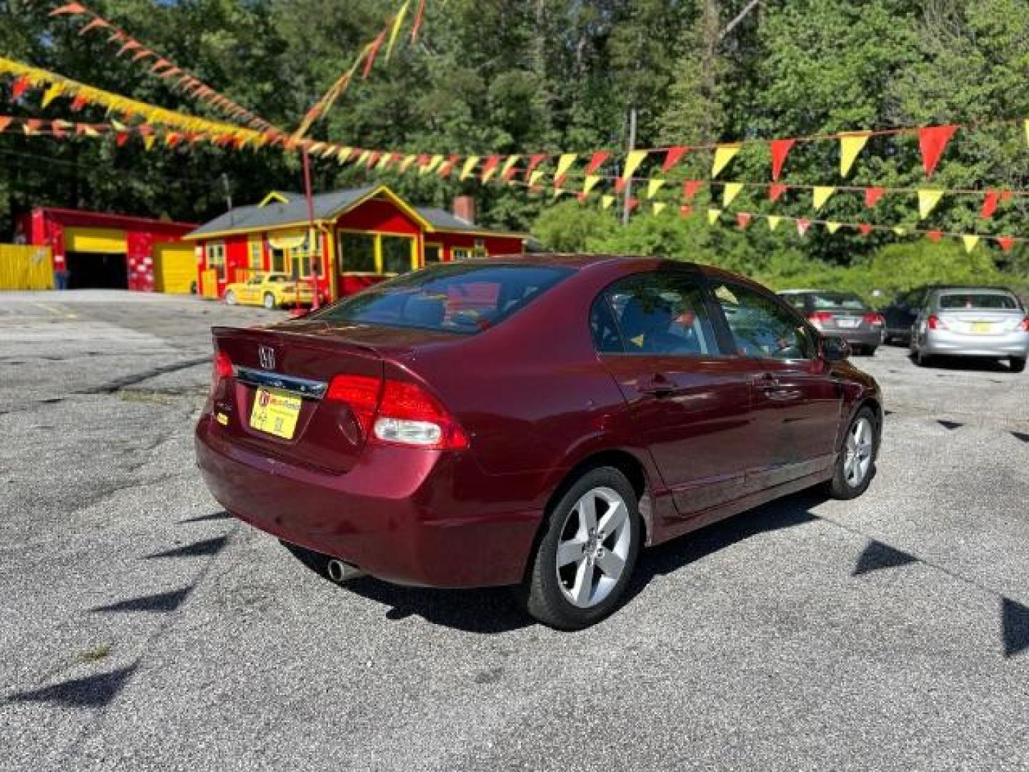 2010 MAROON Honda Civic LX-S Sedan 5-Speed AT (2HGFA1F68AH) with an 1.8L L4 SOHC 16V engine, 5-Speed Automatic transmission, located at 1806 Veterans Memorial Hwy SW, Austell, GA, 30168, (770) 944-9558, 33.817959, -84.606987 - Photo#5