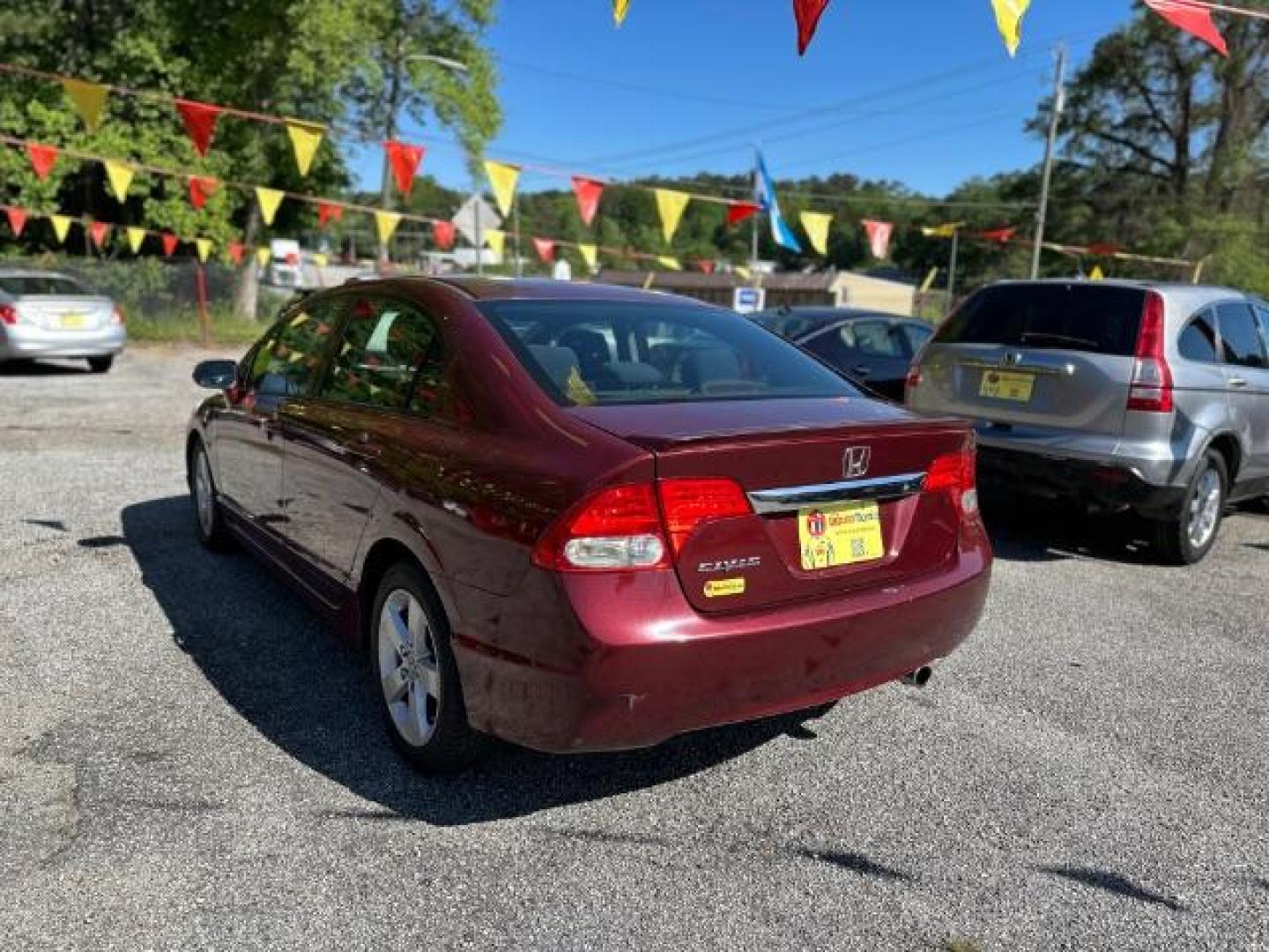 2010 MAROON Honda Civic LX-S Sedan 5-Speed AT (2HGFA1F68AH) with an 1.8L L4 SOHC 16V engine, 5-Speed Automatic transmission, located at 1806 Veterans Memorial Hwy SW, Austell, GA, 30168, (770) 944-9558, 33.817959, -84.606987 - Photo#8