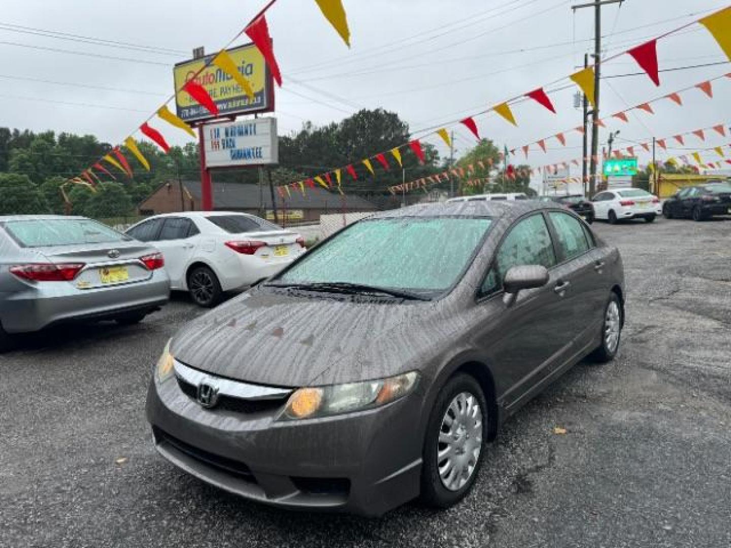 2011 Gray Honda Civic LX Sedan 5-Speed AT (19XFA1F52BE) with an 1.8L L4 SOHC 16V engine, 5-Speed Automatic transmission, located at 1806 Veterans Memorial Hwy SW, Austell, GA, 30168, (770) 944-9558, 33.817959, -84.606987 - Photo#0