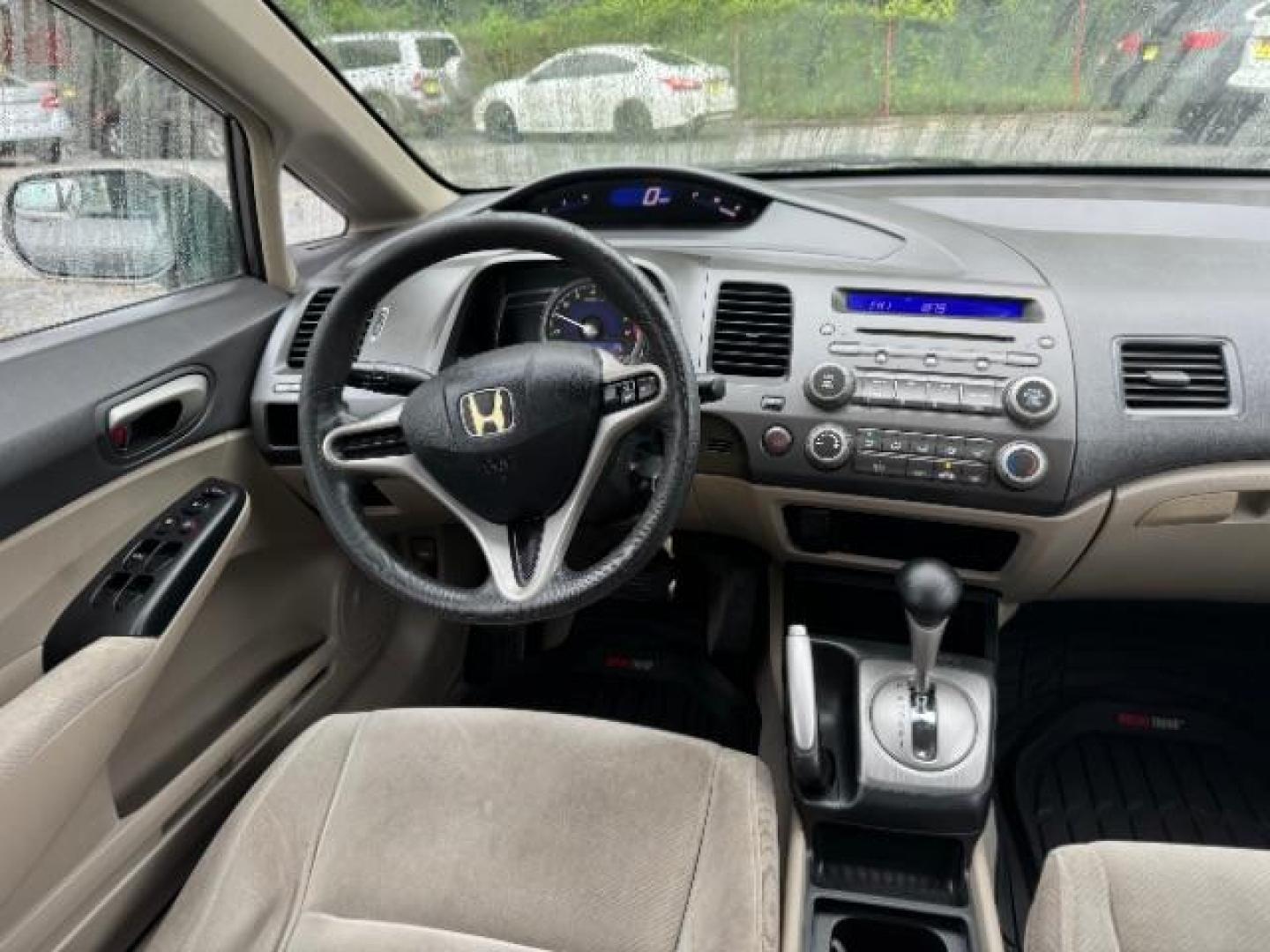 2011 Gray Honda Civic LX Sedan 5-Speed AT (19XFA1F52BE) with an 1.8L L4 SOHC 16V engine, 5-Speed Automatic transmission, located at 1806 Veterans Memorial Hwy SW, Austell, GA, 30168, (770) 944-9558, 33.817959, -84.606987 - Photo#12