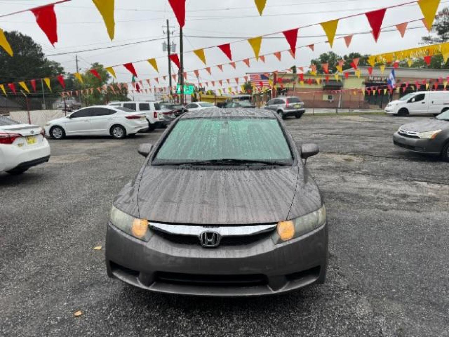 2011 Gray Honda Civic LX Sedan 5-Speed AT (19XFA1F52BE) with an 1.8L L4 SOHC 16V engine, 5-Speed Automatic transmission, located at 1806 Veterans Memorial Hwy SW, Austell, GA, 30168, (770) 944-9558, 33.817959, -84.606987 - Photo#1