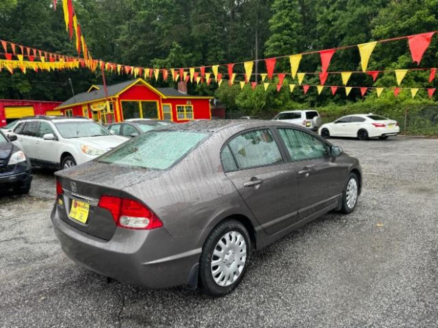 2011 Gray Honda Civic LX Sedan 5-Speed AT (19XFA1F52BE) with an 1.8L L4 SOHC 16V engine, 5-Speed Automatic transmission, located at 1806 Veterans Memorial Hwy SW, Austell, GA, 30168, (770) 944-9558, 33.817959, -84.606987 - Photo#3