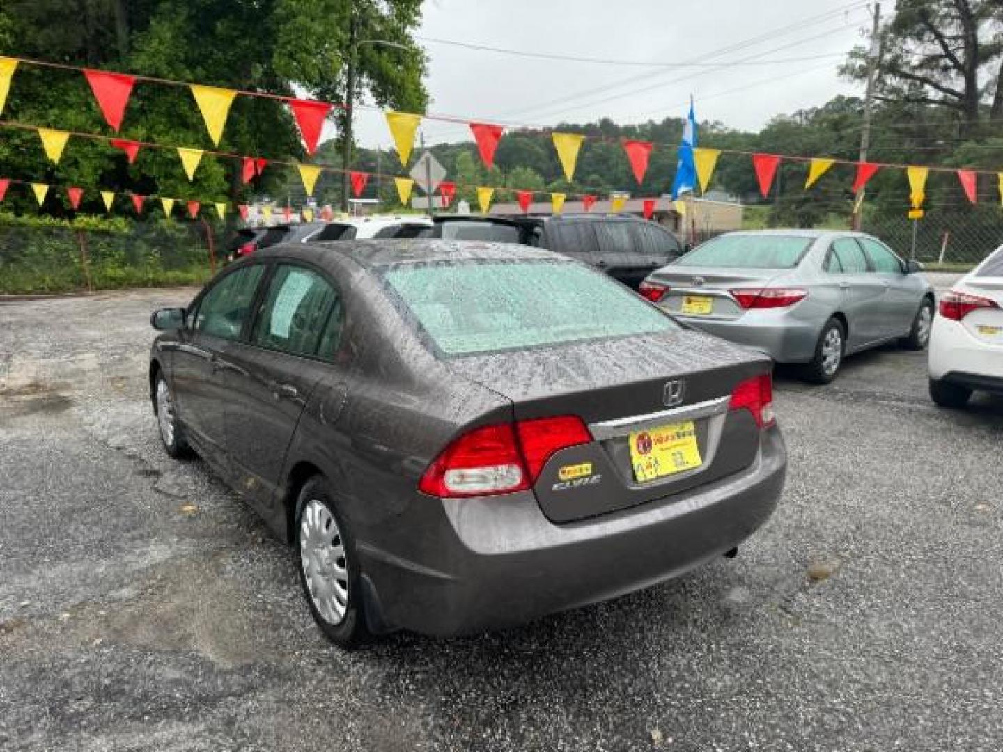 2011 Gray Honda Civic LX Sedan 5-Speed AT (19XFA1F52BE) with an 1.8L L4 SOHC 16V engine, 5-Speed Automatic transmission, located at 1806 Veterans Memorial Hwy SW, Austell, GA, 30168, (770) 944-9558, 33.817959, -84.606987 - Photo#5