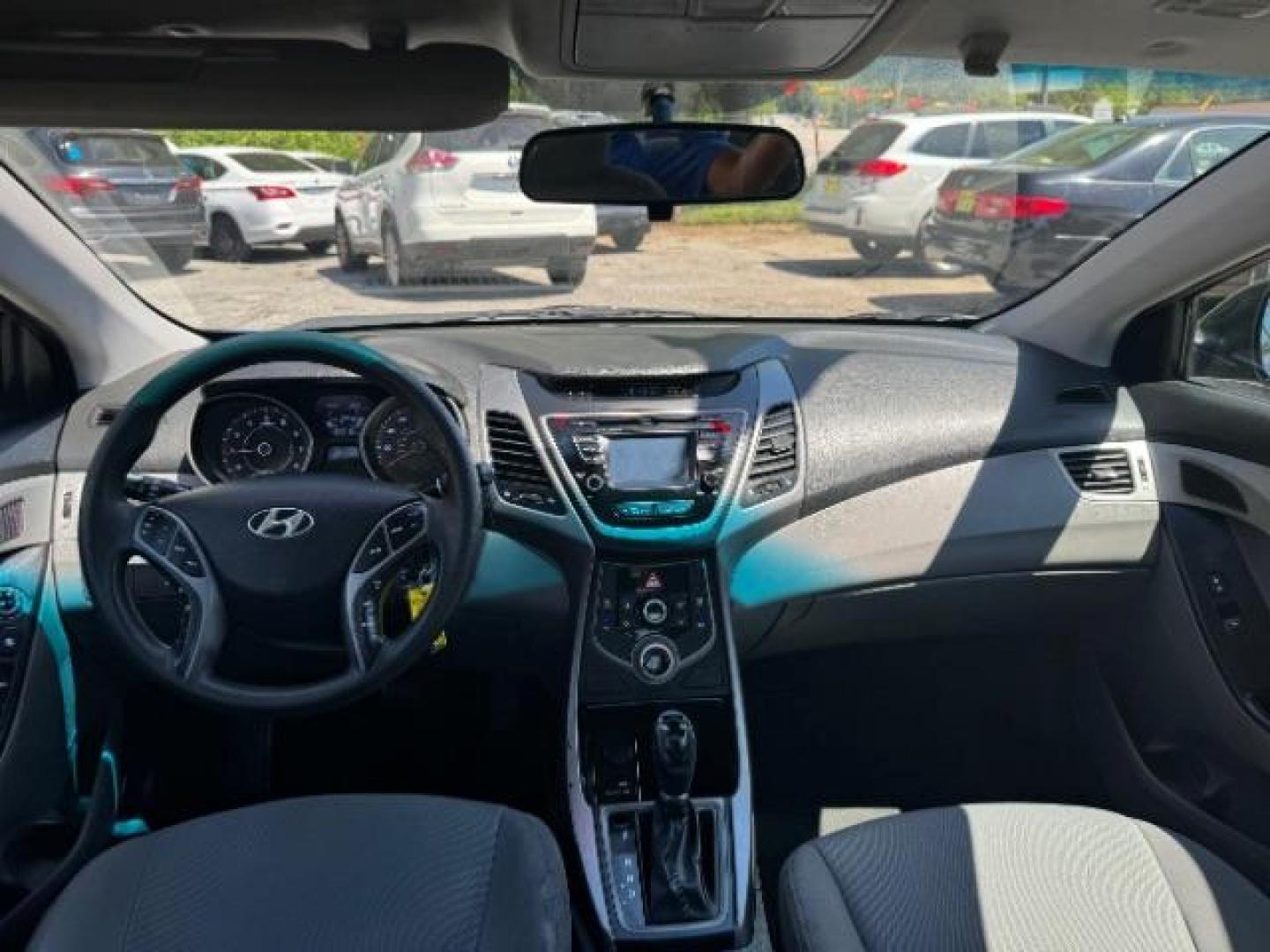 2015 Blue Hyundai Elantra SE 6AT (5NPDH4AE7FH) with an 1.8L L4 DOHC 16V engine, 6-Speed Automatic transmission, located at 1806 Veterans Memorial Hwy SW, Austell, GA, 30168, (770) 944-9558, 33.817959, -84.606987 - Photo#10