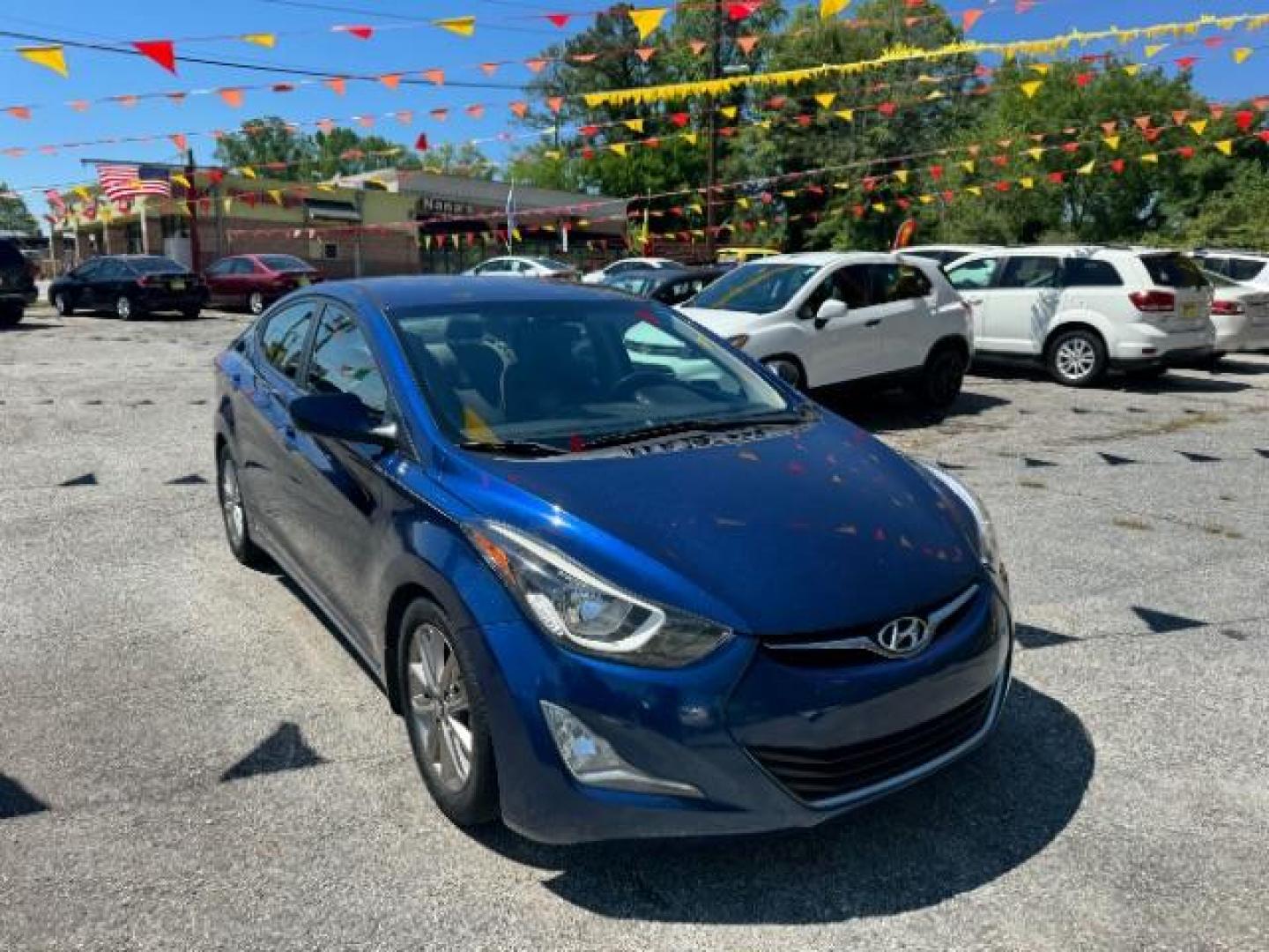 2015 Blue Hyundai Elantra SE 6AT (5NPDH4AE7FH) with an 1.8L L4 DOHC 16V engine, 6-Speed Automatic transmission, located at 1806 Veterans Memorial Hwy SW, Austell, GA, 30168, (770) 944-9558, 33.817959, -84.606987 - Photo#2