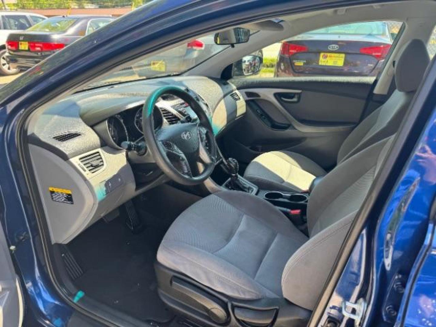 2015 Blue Hyundai Elantra SE 6AT (5NPDH4AE7FH) with an 1.8L L4 DOHC 16V engine, 6-Speed Automatic transmission, located at 1806 Veterans Memorial Hwy SW, Austell, GA, 30168, (770) 944-9558, 33.817959, -84.606987 - Photo#6