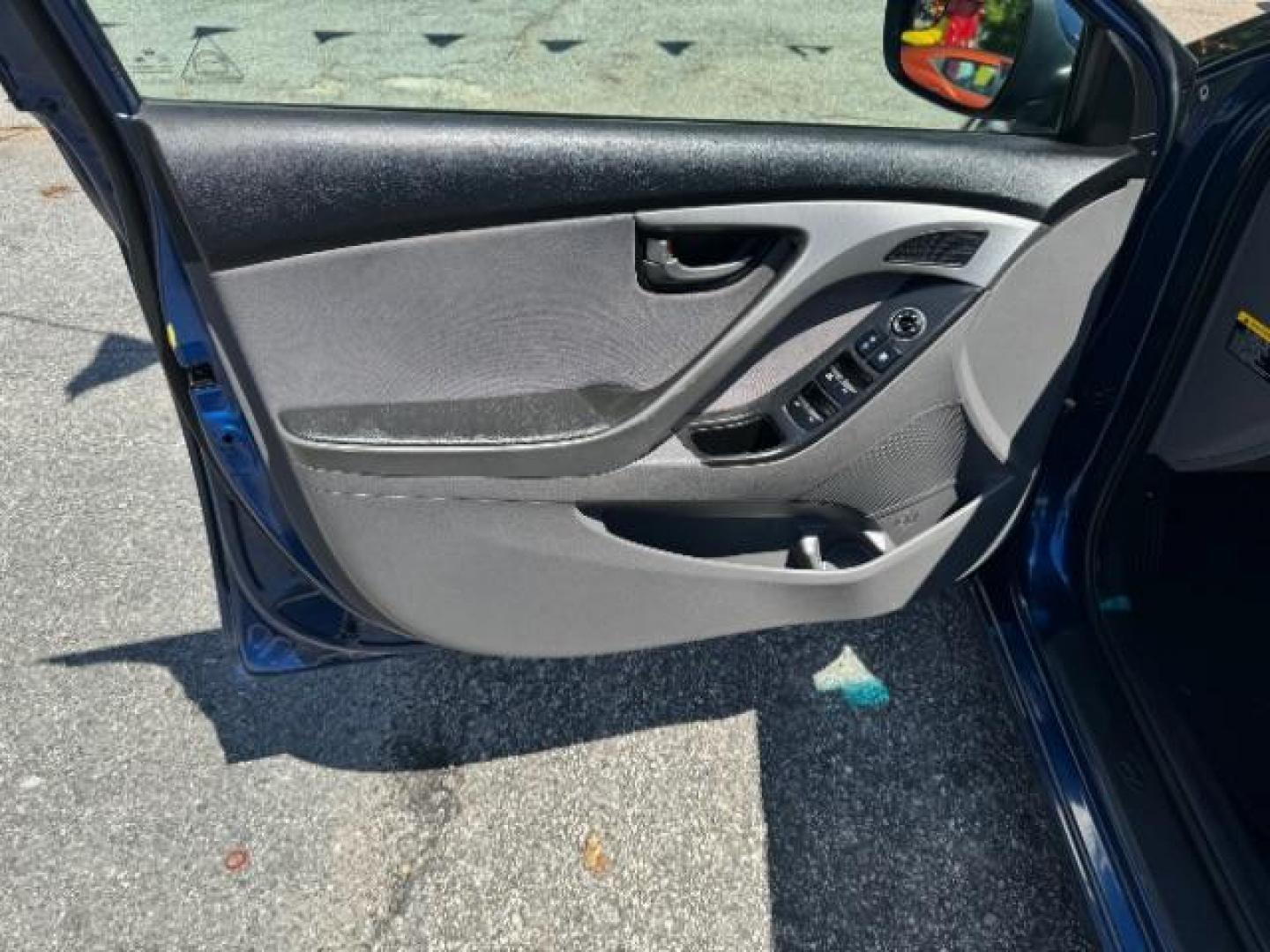 2015 Blue Hyundai Elantra SE 6AT (5NPDH4AE7FH) with an 1.8L L4 DOHC 16V engine, 6-Speed Automatic transmission, located at 1806 Veterans Memorial Hwy SW, Austell, GA, 30168, (770) 944-9558, 33.817959, -84.606987 - Photo#7