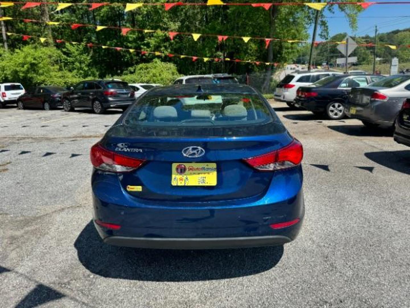 2015 Blue Hyundai Elantra SE 6AT (5NPDH4AE7FH) with an 1.8L L4 DOHC 16V engine, 6-Speed Automatic transmission, located at 1806 Veterans Memorial Hwy SW, Austell, GA, 30168, (770) 944-9558, 33.817959, -84.606987 - Photo#4