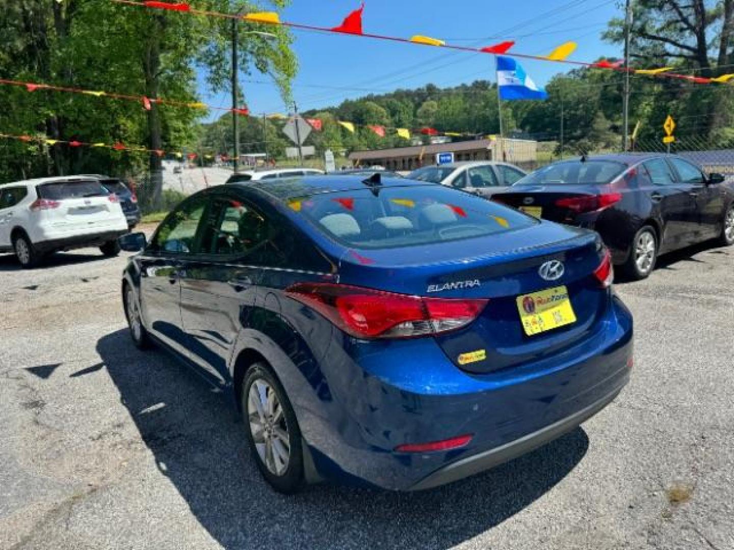 2015 Blue Hyundai Elantra SE 6AT (5NPDH4AE7FH) with an 1.8L L4 DOHC 16V engine, 6-Speed Automatic transmission, located at 1806 Veterans Memorial Hwy SW, Austell, GA, 30168, (770) 944-9558, 33.817959, -84.606987 - Photo#5