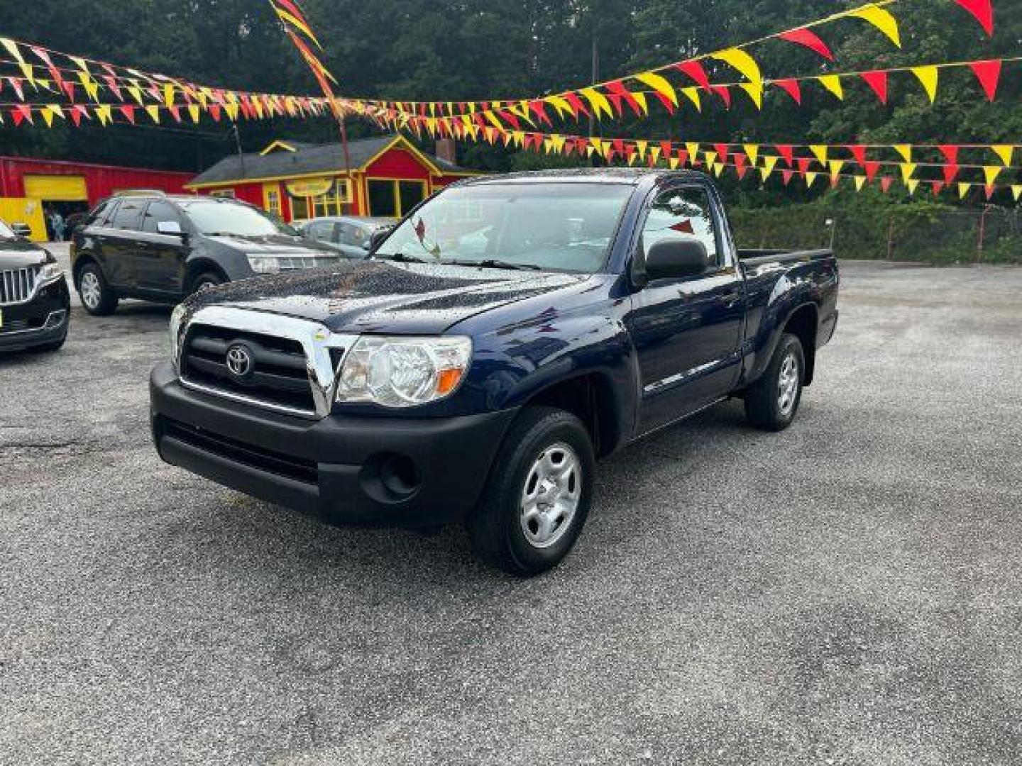 2006 Blue Toyota Tacoma Regular Cab 2WD (5TENX22N36Z) with an 2.7L L4 DOHC 16V engine, 5-Speed Manual transmission, located at 1806 Veterans Memorial Hwy SW, Austell, GA, 30168, (770) 944-9558, 33.817959, -84.606987 - Photo#0