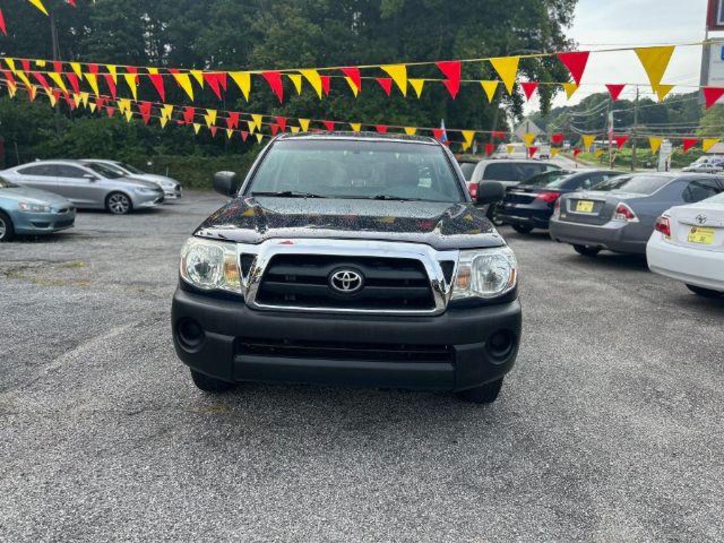 2006 Blue Toyota Tacoma Regular Cab 2WD (5TENX22N36Z) with an 2.7L L4 DOHC 16V engine, 5-Speed Manual transmission, located at 1806 Veterans Memorial Hwy SW, Austell, GA, 30168, (770) 944-9558, 33.817959, -84.606987 - Photo#1