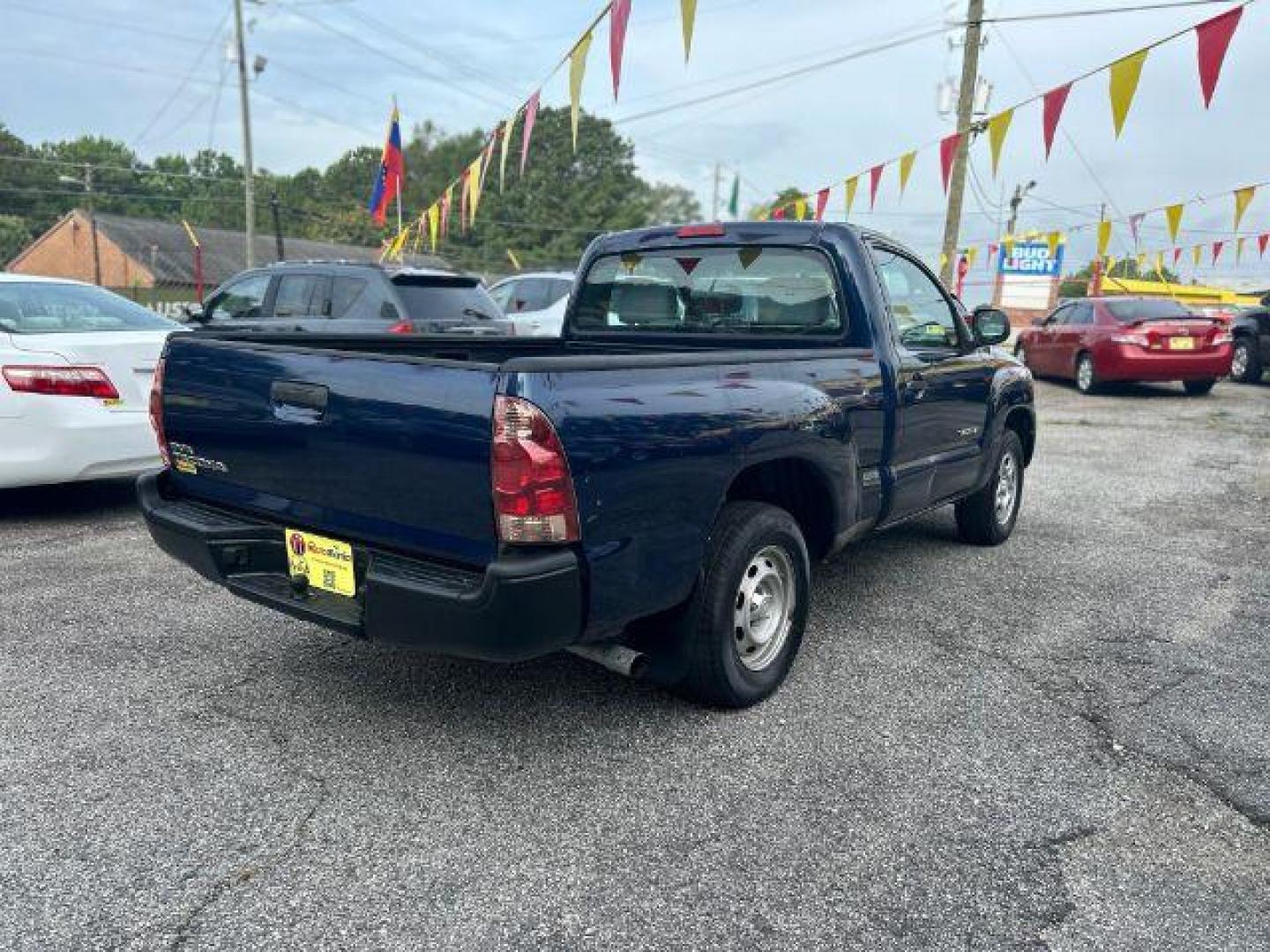 2006 Blue Toyota Tacoma Regular Cab 2WD (5TENX22N36Z) with an 2.7L L4 DOHC 16V engine, 5-Speed Manual transmission, located at 1806 Veterans Memorial Hwy SW, Austell, GA, 30168, (770) 944-9558, 33.817959, -84.606987 - Photo#3