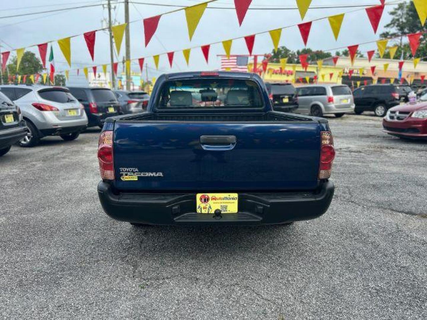 2006 Blue Toyota Tacoma Regular Cab 2WD (5TENX22N36Z) with an 2.7L L4 DOHC 16V engine, 5-Speed Manual transmission, located at 1806 Veterans Memorial Hwy SW, Austell, GA, 30168, (770) 944-9558, 33.817959, -84.606987 - Photo#4