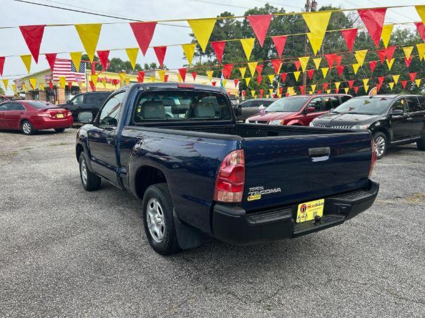 2006 Blue Toyota Tacoma Regular Cab 2WD (5TENX22N36Z) with an 2.7L L4 DOHC 16V engine, 5-Speed Manual transmission, located at 1806 Veterans Memorial Hwy SW, Austell, GA, 30168, (770) 944-9558, 33.817959, -84.606987 - Photo#5