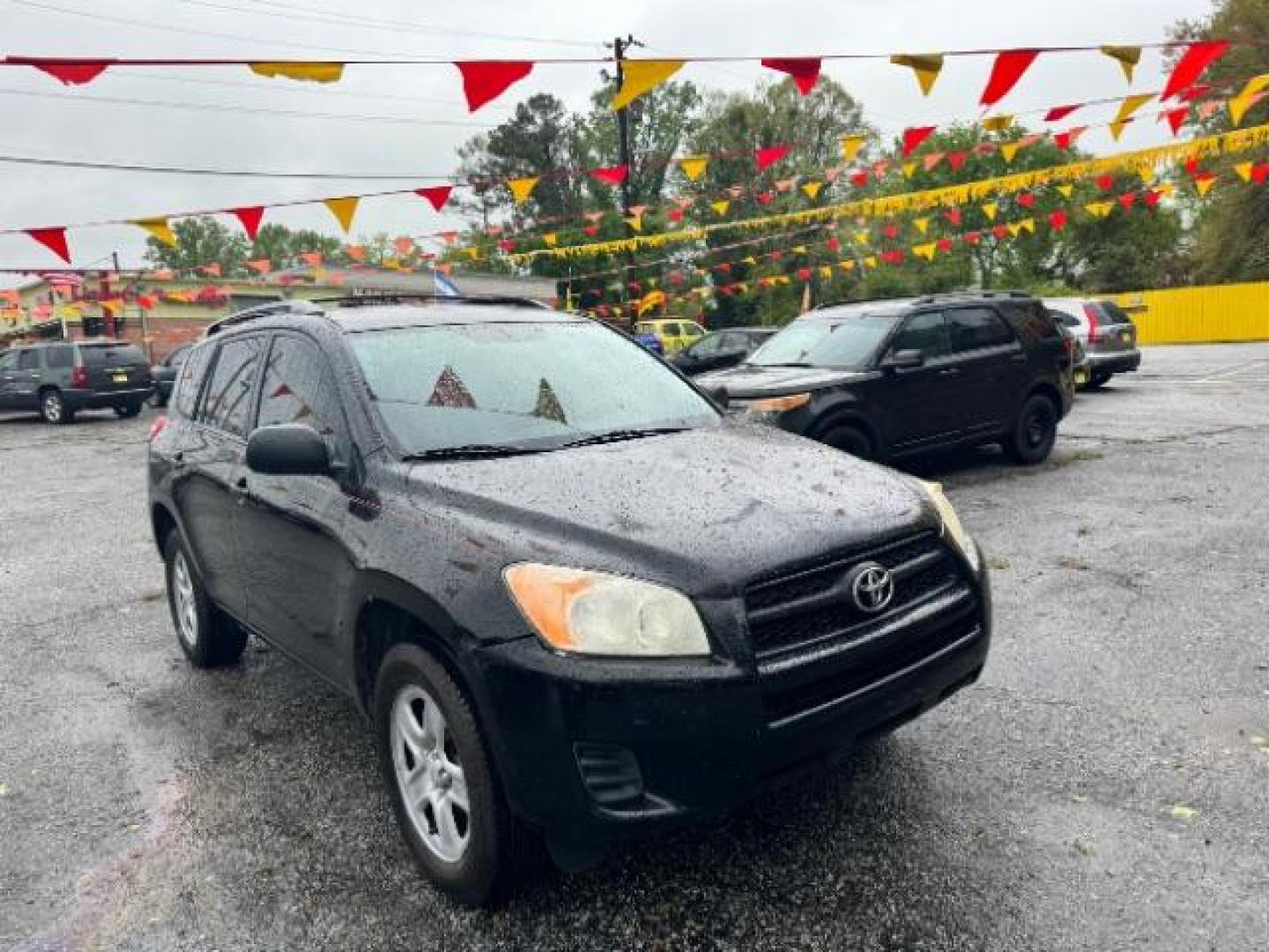 2012 Black Toyota RAV4 Base I4 2WD (2T3ZF4DV0CW) with an 2.4L L4 DOHC 16V engine, 4-Speed Automatic transmission, located at 1806 Veterans Memorial Hwy SW, Austell, GA, 30168, (770) 944-9558, 33.817959, -84.606987 - Photo#2