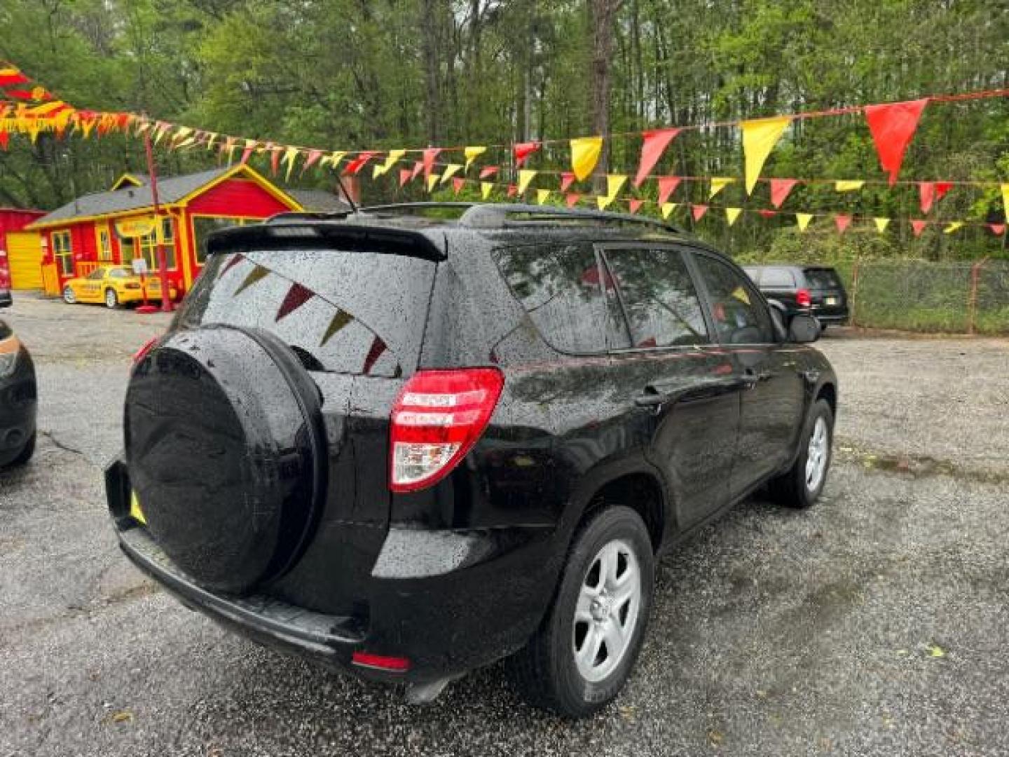 2012 Black Toyota RAV4 Base I4 2WD (2T3ZF4DV0CW) with an 2.4L L4 DOHC 16V engine, 4-Speed Automatic transmission, located at 1806 Veterans Memorial Hwy SW, Austell, GA, 30168, (770) 944-9558, 33.817959, -84.606987 - Photo#3