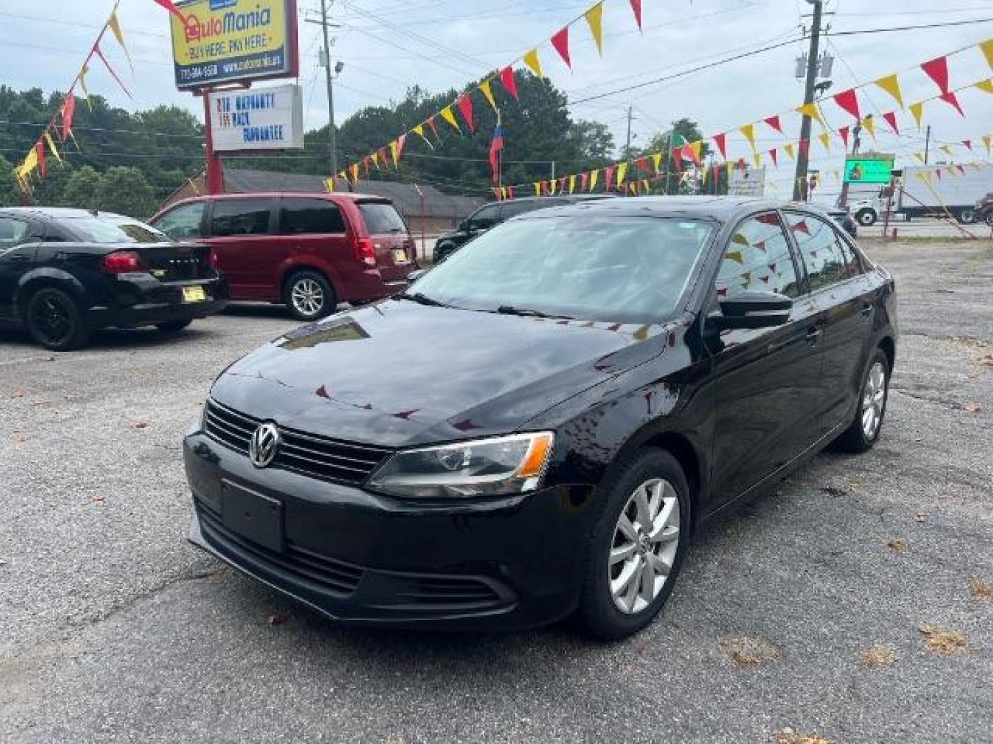 2011 Black Volkswagen Jetta SE PZEV (3VWDZ7AJ7BM) with an 2.5L L5 DOHC 20V engine, located at 1806 Veterans Memorial Hwy SW, Austell, GA, 30168, (770) 944-9558, 33.817959, -84.606987 - Photo#0