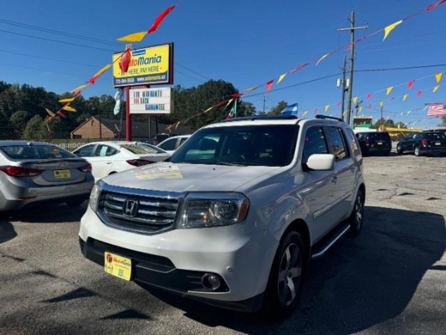 2012 White Honda Pilot Touring 4WD 5-Spd AT with DVD (5FNYF4H9XCB) with an 3.5L V6 SOHC 24V engine, 5-Speed Automatic transmission, located at 1806 Veterans Memorial Hwy SW, Austell, GA, 30168, (770) 944-9558, 33.817959, -84.606987 - Photo#0