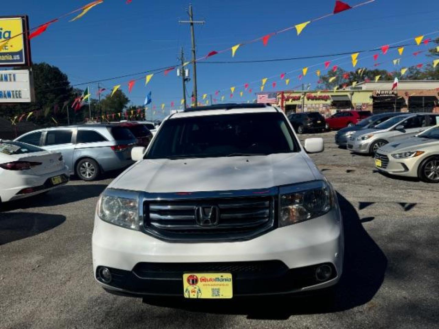 2012 White Honda Pilot Touring 4WD 5-Spd AT with DVD (5FNYF4H9XCB) with an 3.5L V6 SOHC 24V engine, 5-Speed Automatic transmission, located at 1806 Veterans Memorial Hwy SW, Austell, GA, 30168, (770) 944-9558, 33.817959, -84.606987 - Photo#1