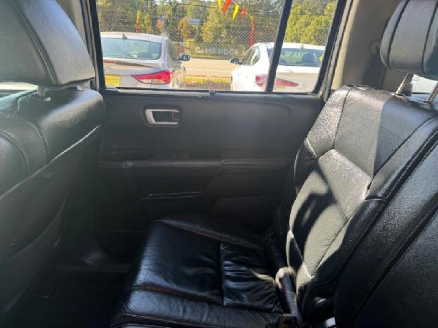 2012 White Honda Pilot Touring 4WD 5-Spd AT with DVD (5FNYF4H9XCB) with an 3.5L V6 SOHC 24V engine, 5-Speed Automatic transmission, located at 1806 Veterans Memorial Hwy SW, Austell, GA, 30168, (770) 944-9558, 33.817959, -84.606987 - Photo#16