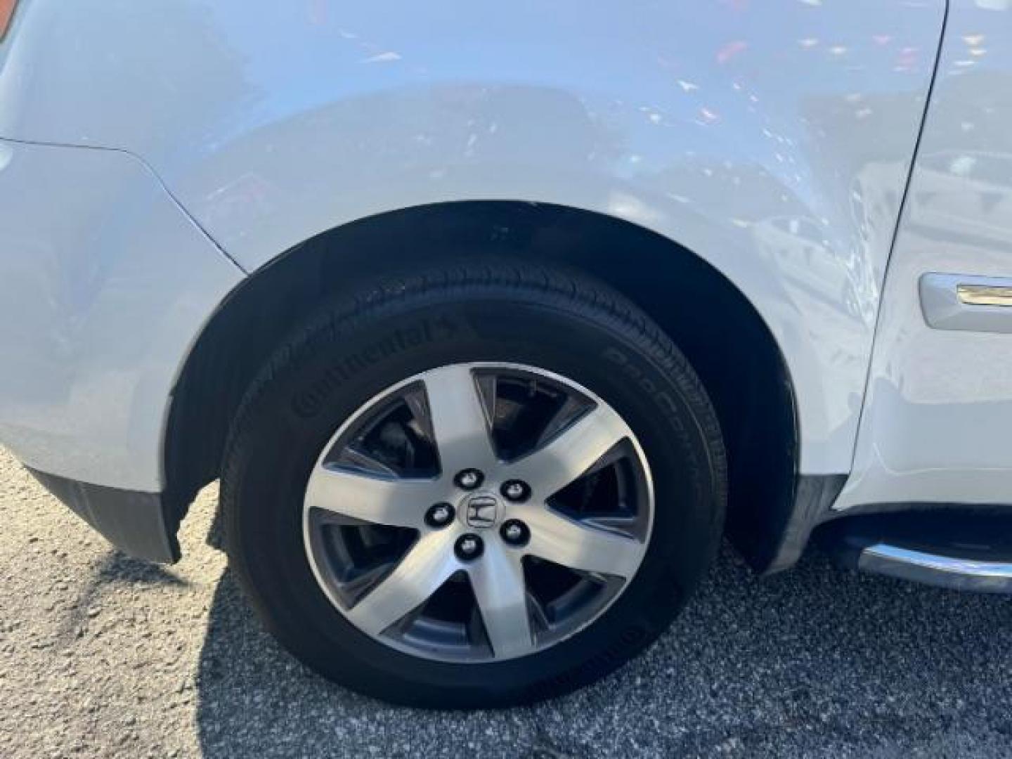 2012 White Honda Pilot Touring 4WD 5-Spd AT with DVD (5FNYF4H9XCB) with an 3.5L V6 SOHC 24V engine, 5-Speed Automatic transmission, located at 1806 Veterans Memorial Hwy SW, Austell, GA, 30168, (770) 944-9558, 33.817959, -84.606987 - Photo#23