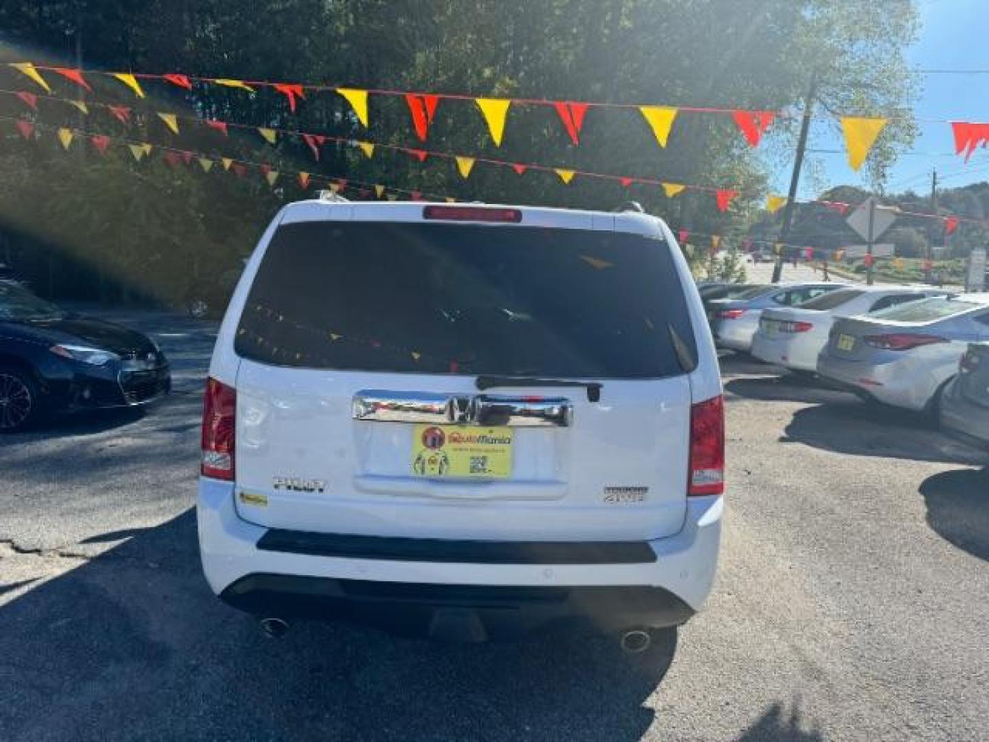 2012 White Honda Pilot Touring 4WD 5-Spd AT with DVD (5FNYF4H9XCB) with an 3.5L V6 SOHC 24V engine, 5-Speed Automatic transmission, located at 1806 Veterans Memorial Hwy SW, Austell, GA, 30168, (770) 944-9558, 33.817959, -84.606987 - Photo#4