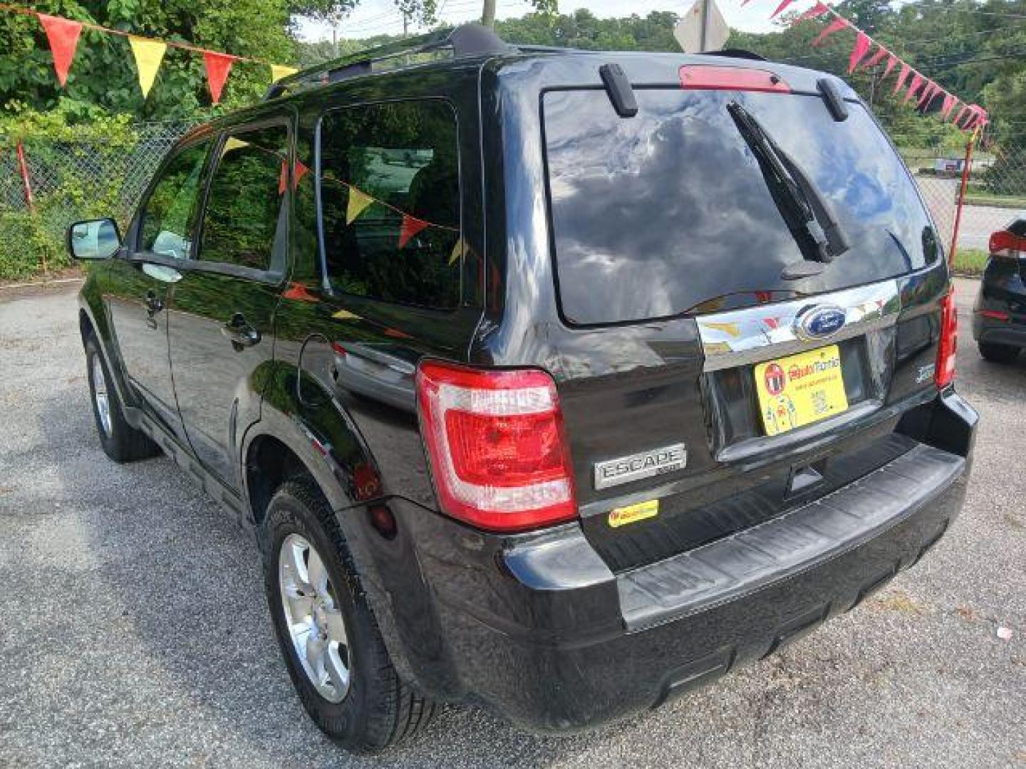 2011 Black Ford Escape Limited FWD (1FMCU0EG4BK) with an 3.0L V6 DOHC 24V engine, 6-Speed Automatic transmission, located at 1806 Veterans Memorial Hwy SW, Austell, GA, 30168, (770) 944-9558, 33.817959, -84.606987 - Photo#10