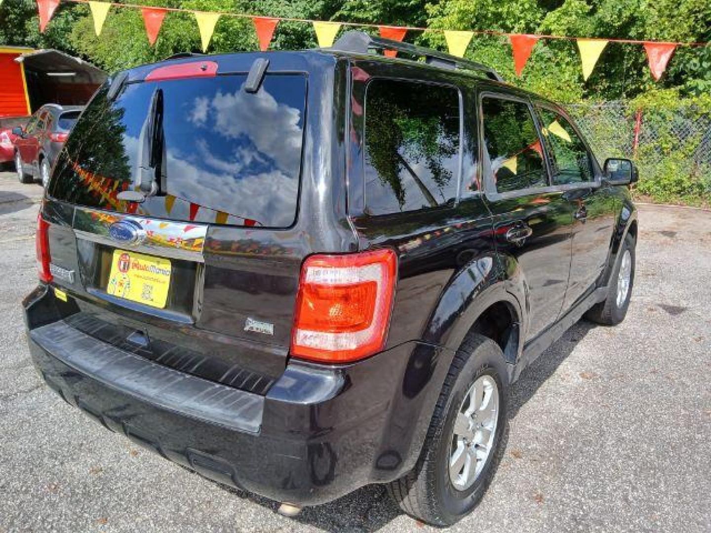 2011 Black Ford Escape Limited FWD (1FMCU0EG4BK) with an 3.0L V6 DOHC 24V engine, 6-Speed Automatic transmission, located at 1806 Veterans Memorial Hwy SW, Austell, GA, 30168, (770) 944-9558, 33.817959, -84.606987 - Photo#11