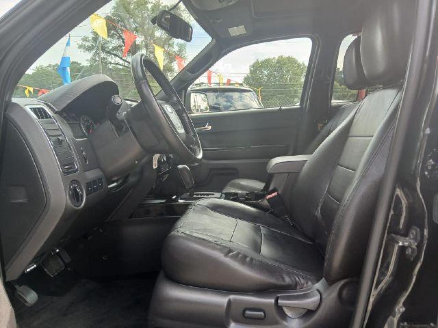 2011 Black Ford Escape Limited FWD (1FMCU0EG4BK) with an 3.0L V6 DOHC 24V engine, 6-Speed Automatic transmission, located at 1806 Veterans Memorial Hwy SW, Austell, GA, 30168, (770) 944-9558, 33.817959, -84.606987 - Photo#3