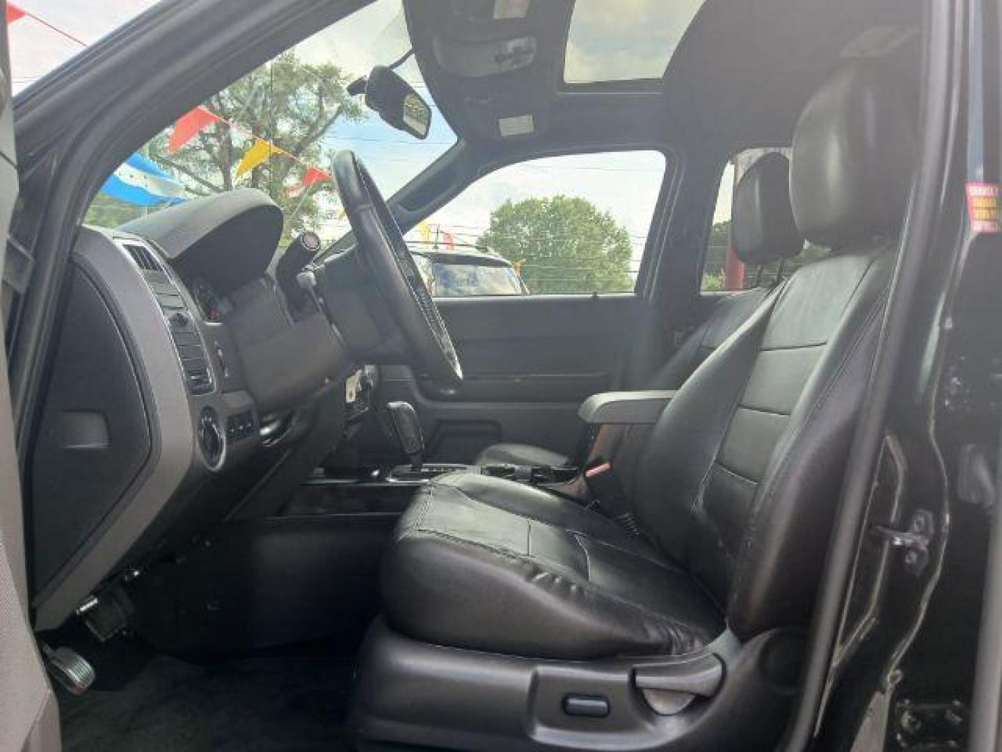 2011 Black Ford Escape Limited FWD (1FMCU0EG4BK) with an 3.0L V6 DOHC 24V engine, 6-Speed Automatic transmission, located at 1806 Veterans Memorial Hwy SW, Austell, GA, 30168, (770) 944-9558, 33.817959, -84.606987 - Photo#4