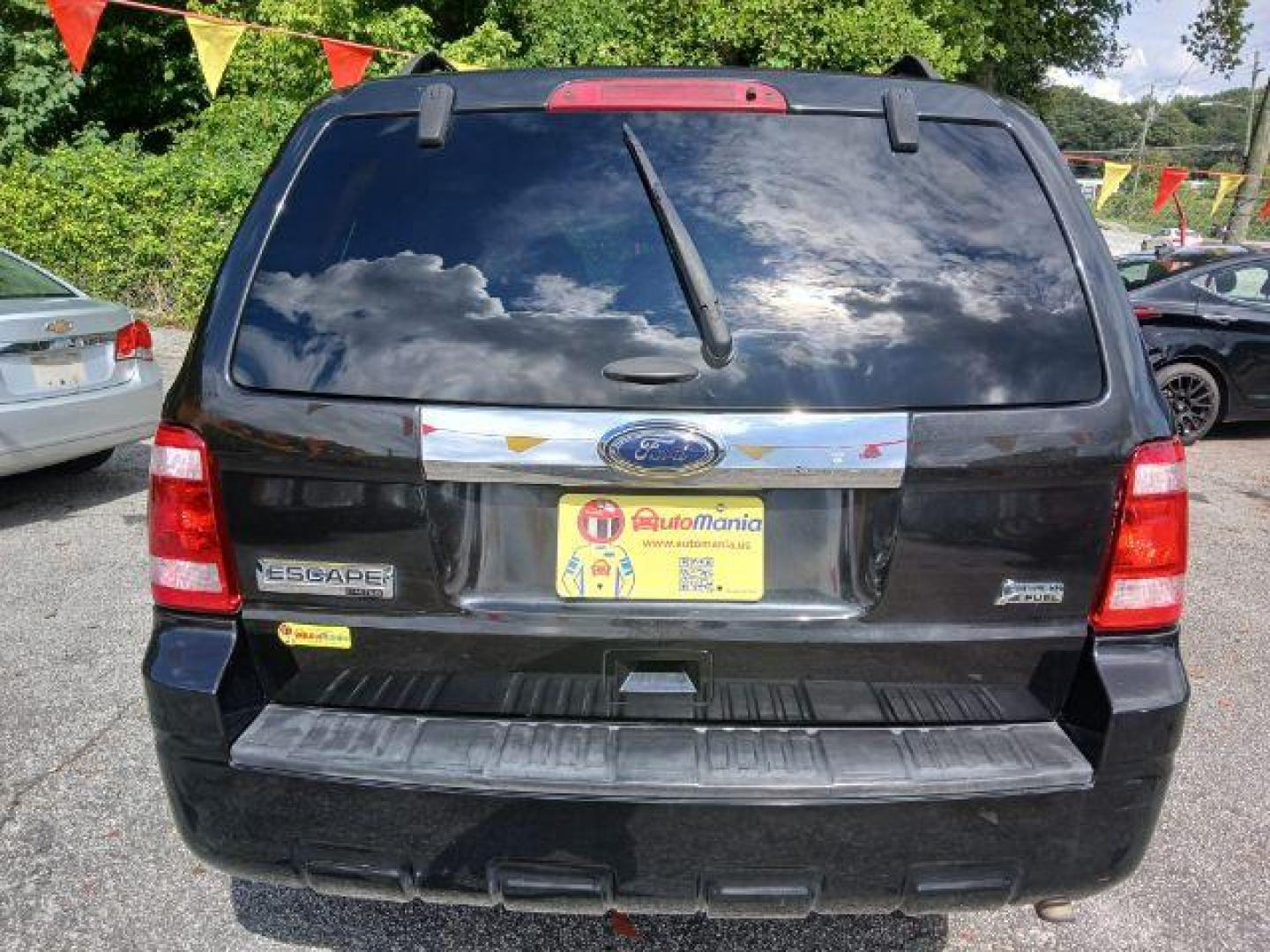 2011 Black Ford Escape Limited FWD (1FMCU0EG4BK) with an 3.0L V6 DOHC 24V engine, 6-Speed Automatic transmission, located at 1806 Veterans Memorial Hwy SW, Austell, GA, 30168, (770) 944-9558, 33.817959, -84.606987 - Photo#9