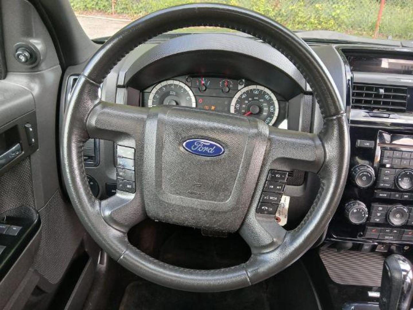 2011 Black Ford Escape Limited FWD (1FMCU0EG4BK) with an 3.0L V6 DOHC 24V engine, 6-Speed Automatic transmission, located at 1806 Veterans Memorial Hwy SW, Austell, GA, 30168, (770) 944-9558, 33.817959, -84.606987 - Photo#19