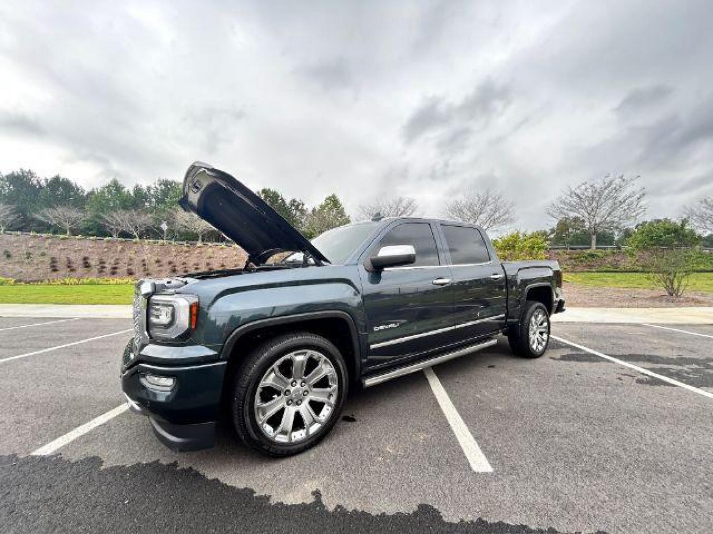 2017 Gray GMC Sierra 1500 Denali Crew Cab Long Box 4WD (3GTU2PEJ4HG) with an 6.2L V8 OHV 16V engine, 6-Speed Automatic transmission, located at 1806 Veterans Memorial Hwy SW, Austell, GA, 30168, (770) 944-9558, 33.817959, -84.606987 - This All Wheel Drive Denali is in pretty much excellent condition inside, Outside, Mechanical. Previous owner(s) took excellent care of this Beautiful truck $29950 Cash Only. No Financing. No funny smells. No smoke odors. Interior is like new condition. Everything works. NO accident history. Manufa - Photo#42
